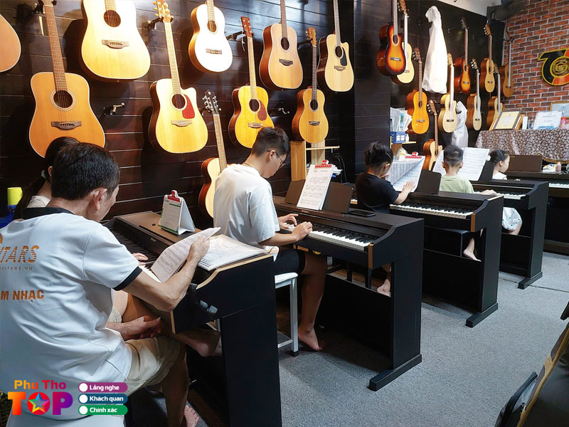 Trung-tam-am-nhac-tcguitars-phuthotoplist