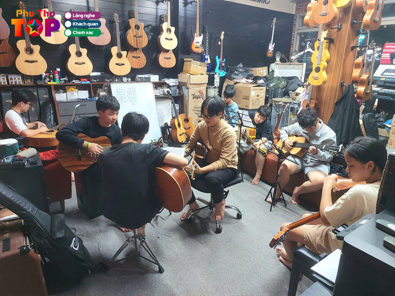 Trung-tam-am-nhac-tcguitars-phuthotoplist